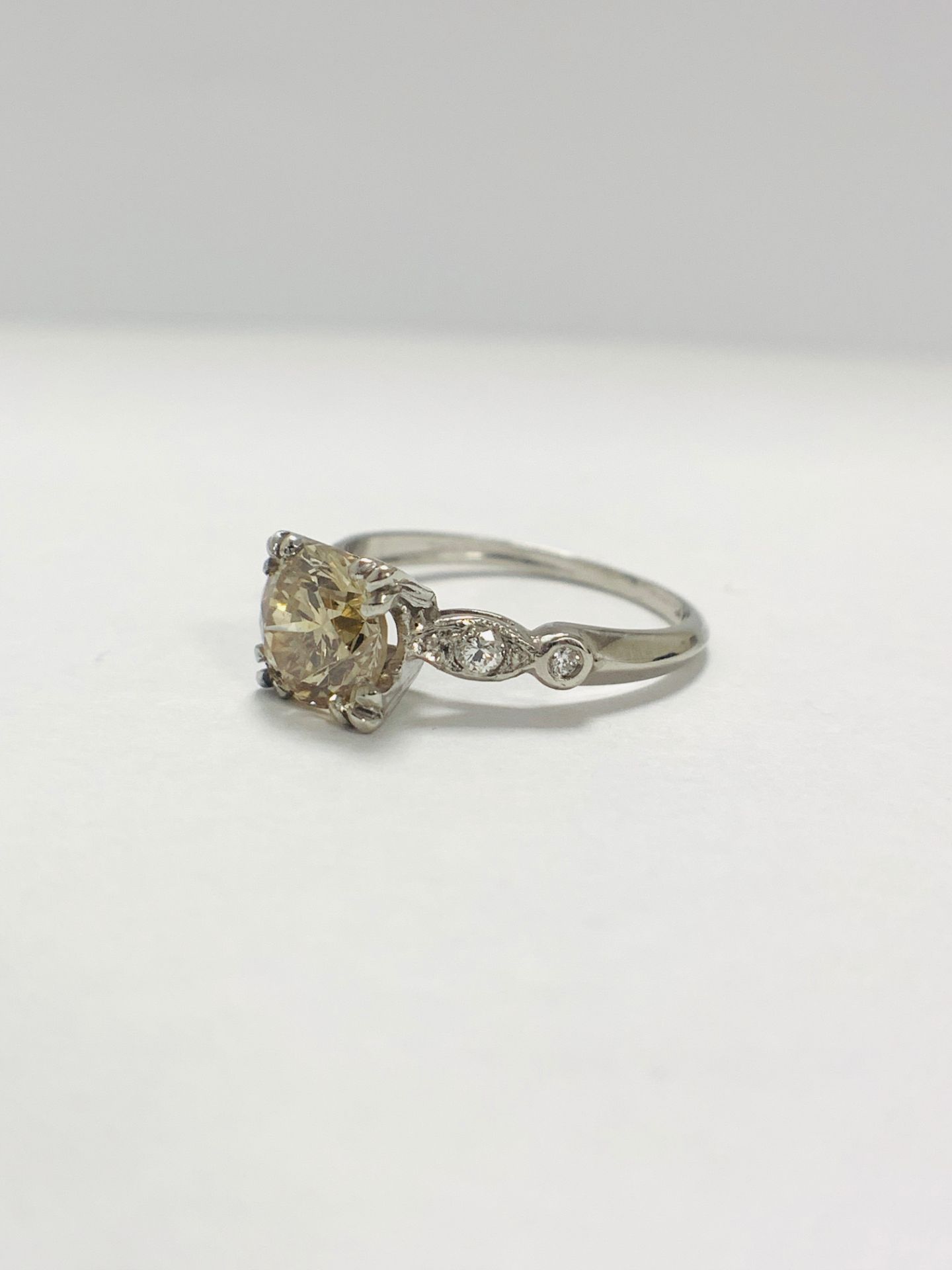 Platinum Diamond ring featuring centre, round brilliant cut, fancy light brown Diamond (1.55ct) - Image 2 of 14