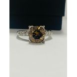 Platinum Diamond Ring Featuring Centre, Round Brilliant Cut, Medium Yellowish Brown Diamond (3.20ct)