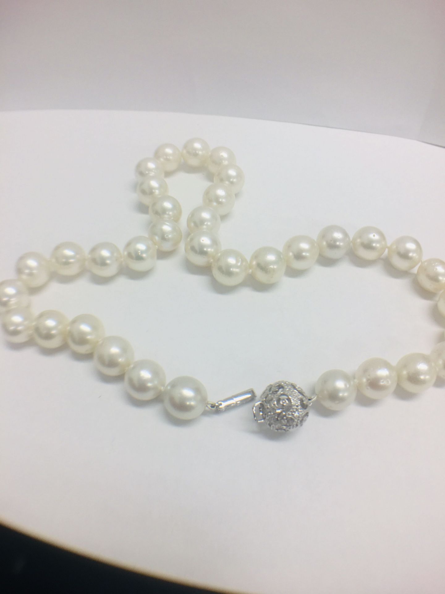 Strand 35 South Sea Pearls with 14ct White Gold Filagree Style Ball - Image 2 of 9