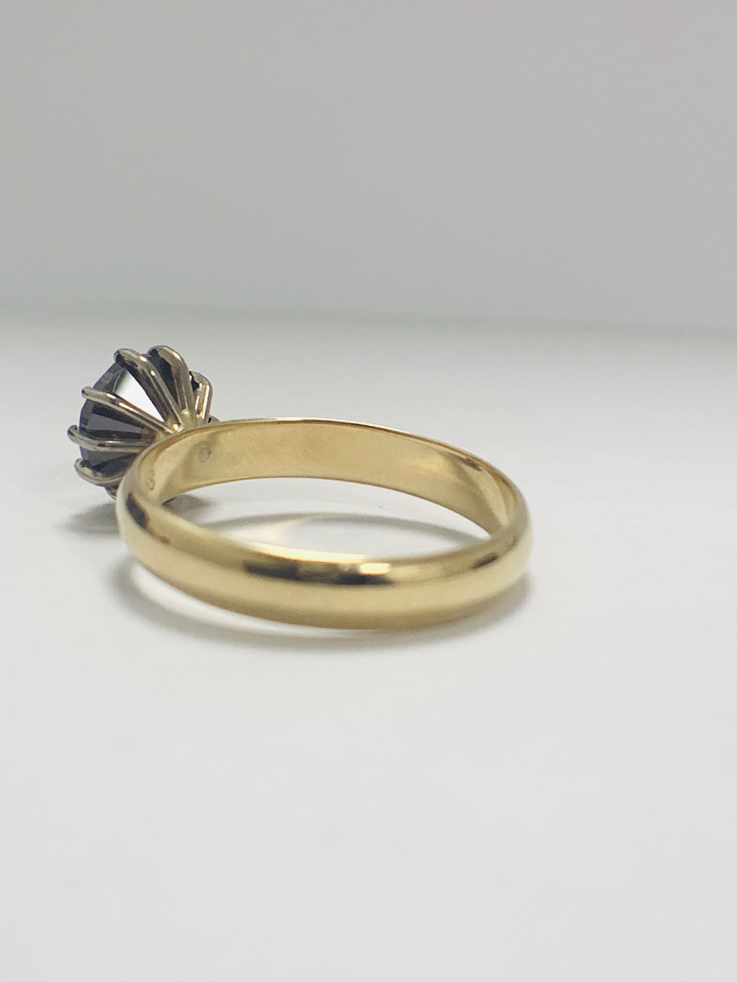 18ct Yellow Gold Diamond ring featuring centre, round brilliant cut, deep orangey brown Diamond (3.3 - Image 4 of 13