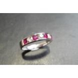 Ruby And Diamond Eternity Band Ring Set In 9Ct White Gold.