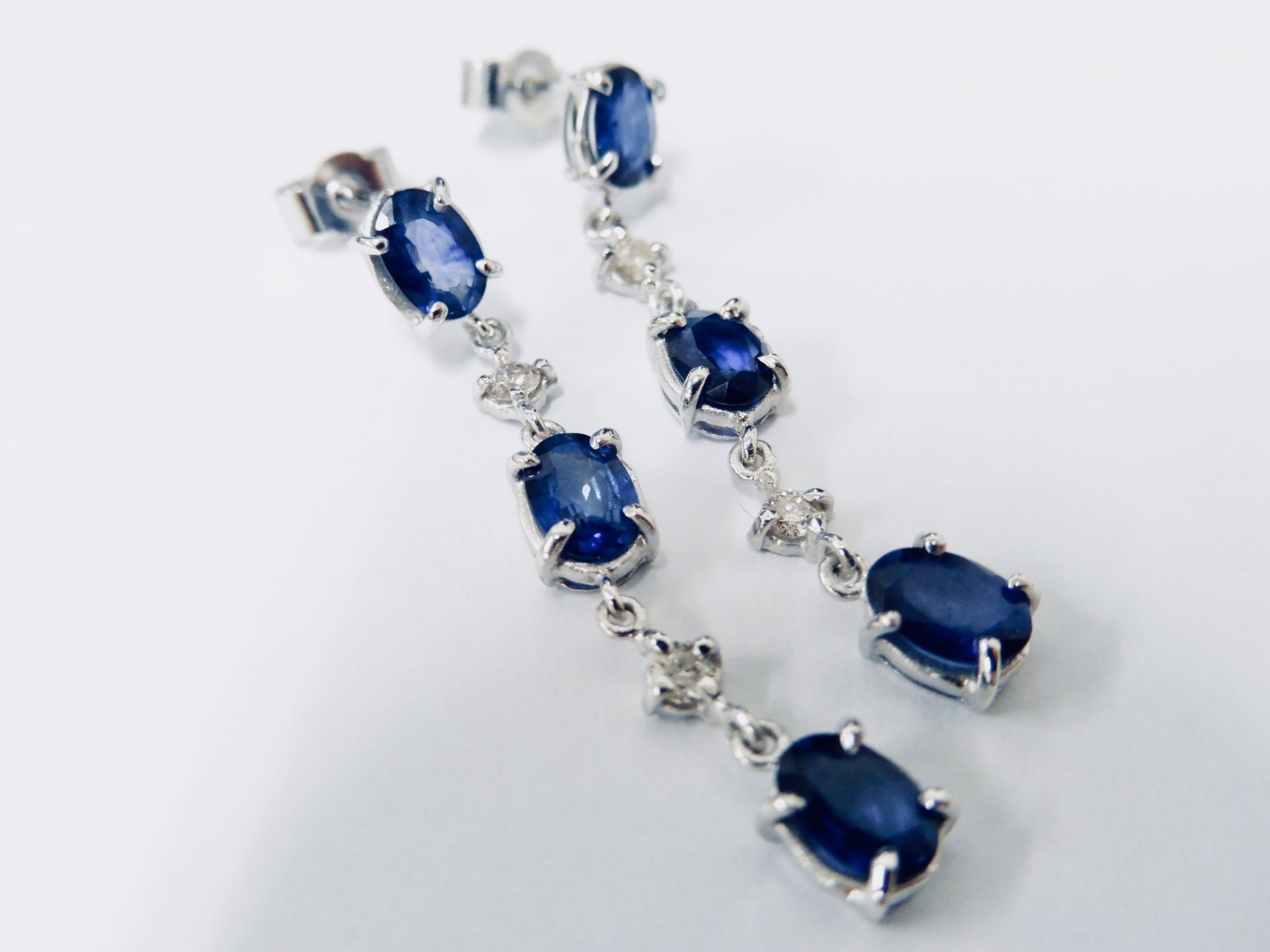 Sapphire And Diamond Drop Style Earrings Set In 18Ct Gold.