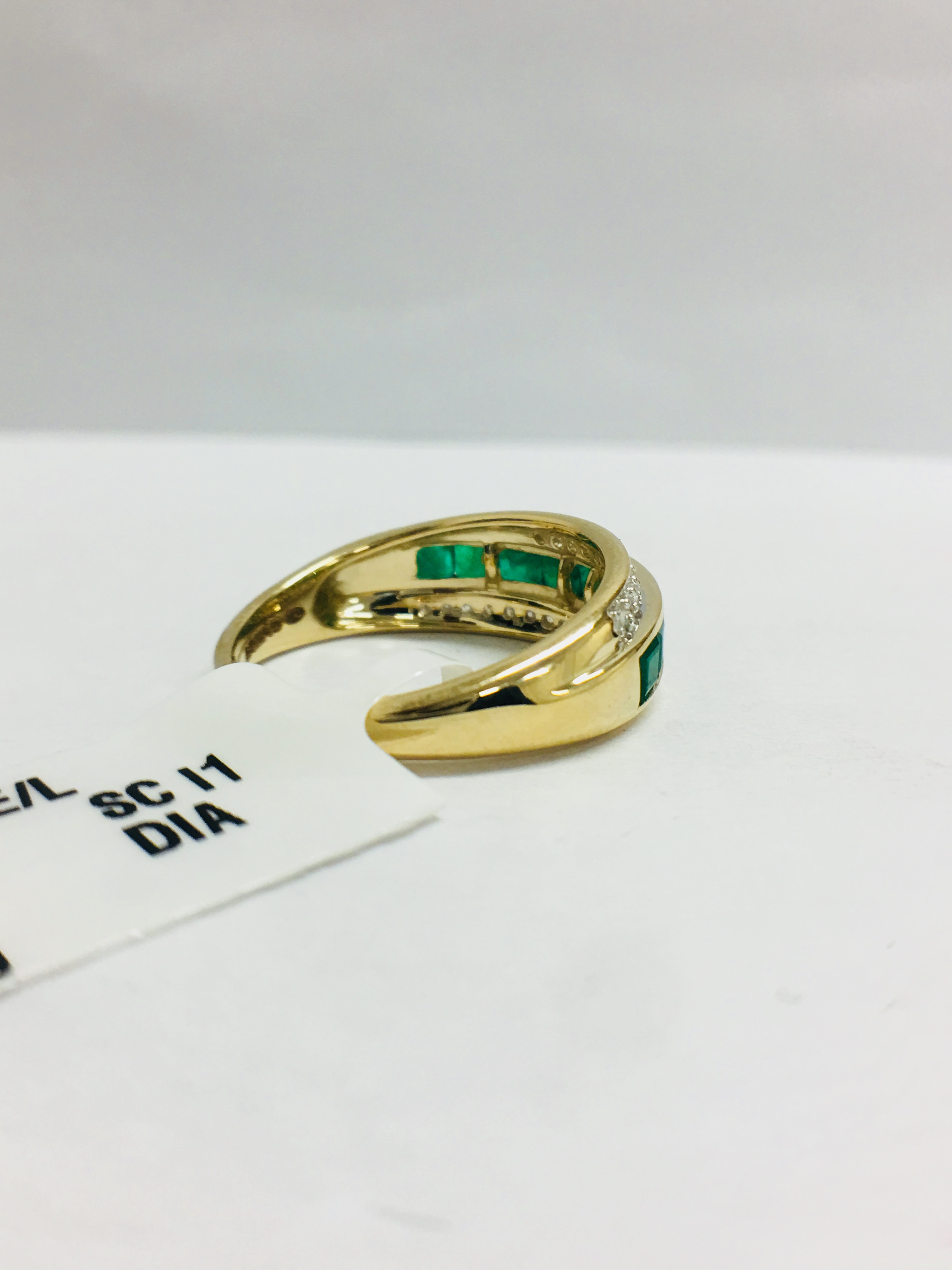 9Ct Yellow Gold Diamond Emerald Crossover Style Ring, - Image 6 of 10