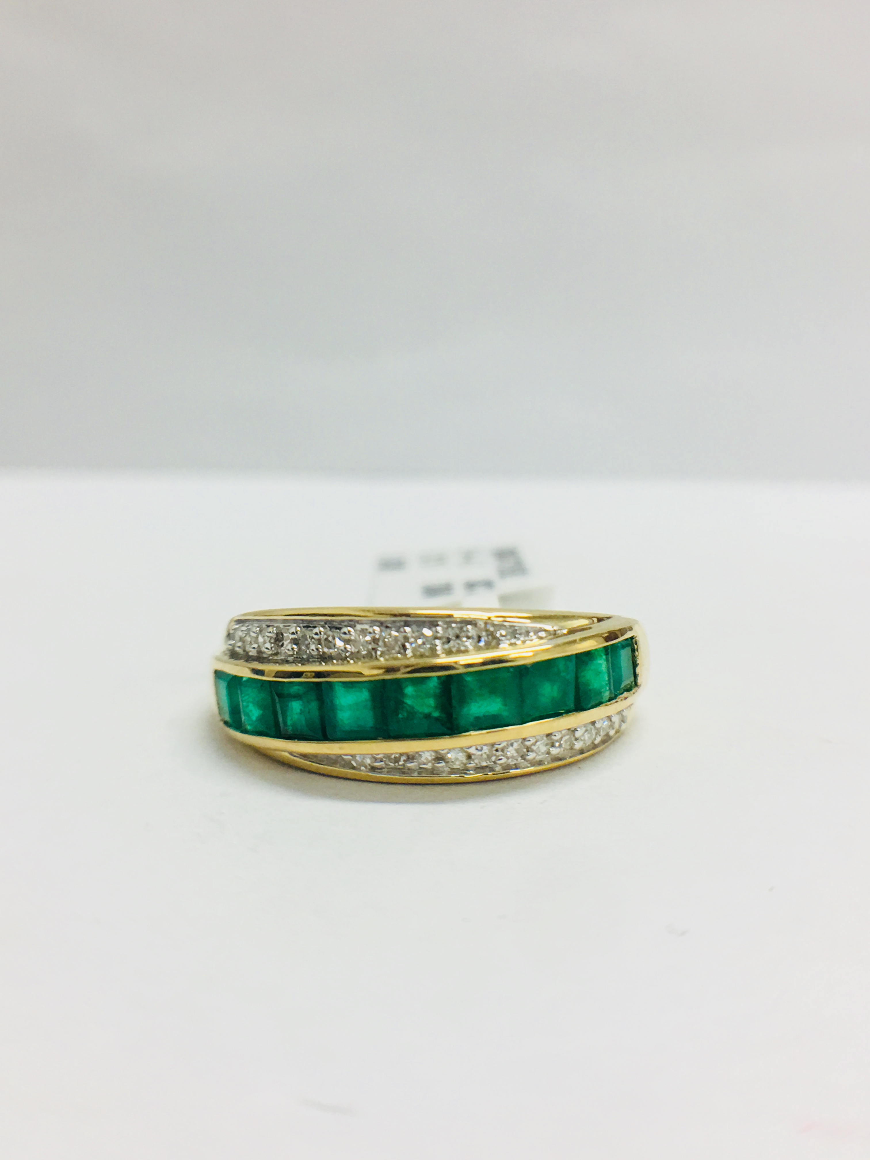9Ct Yellow Gold Diamond Emerald Crossover Style Ring,