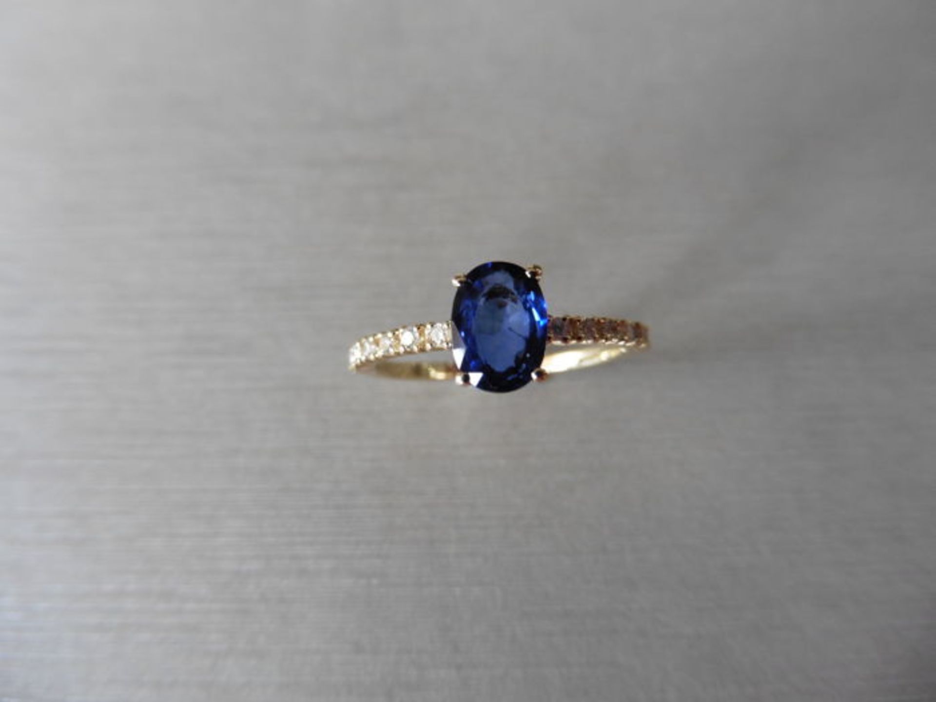 0.80Ct / 0.12Ct Sapphire And Diamond Dress Ring.