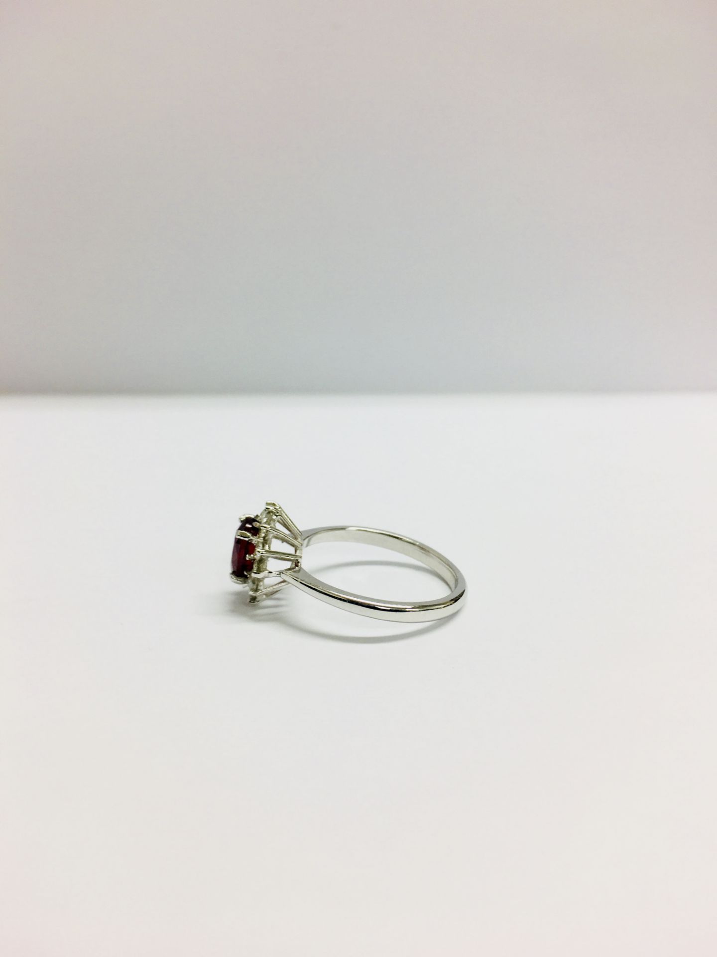 0.80Ct Ruby And Diamond Cluster Ring Set With A Oval Cut(Glass Filled) Ruby Which Is Surrounded By - Image 2 of 5