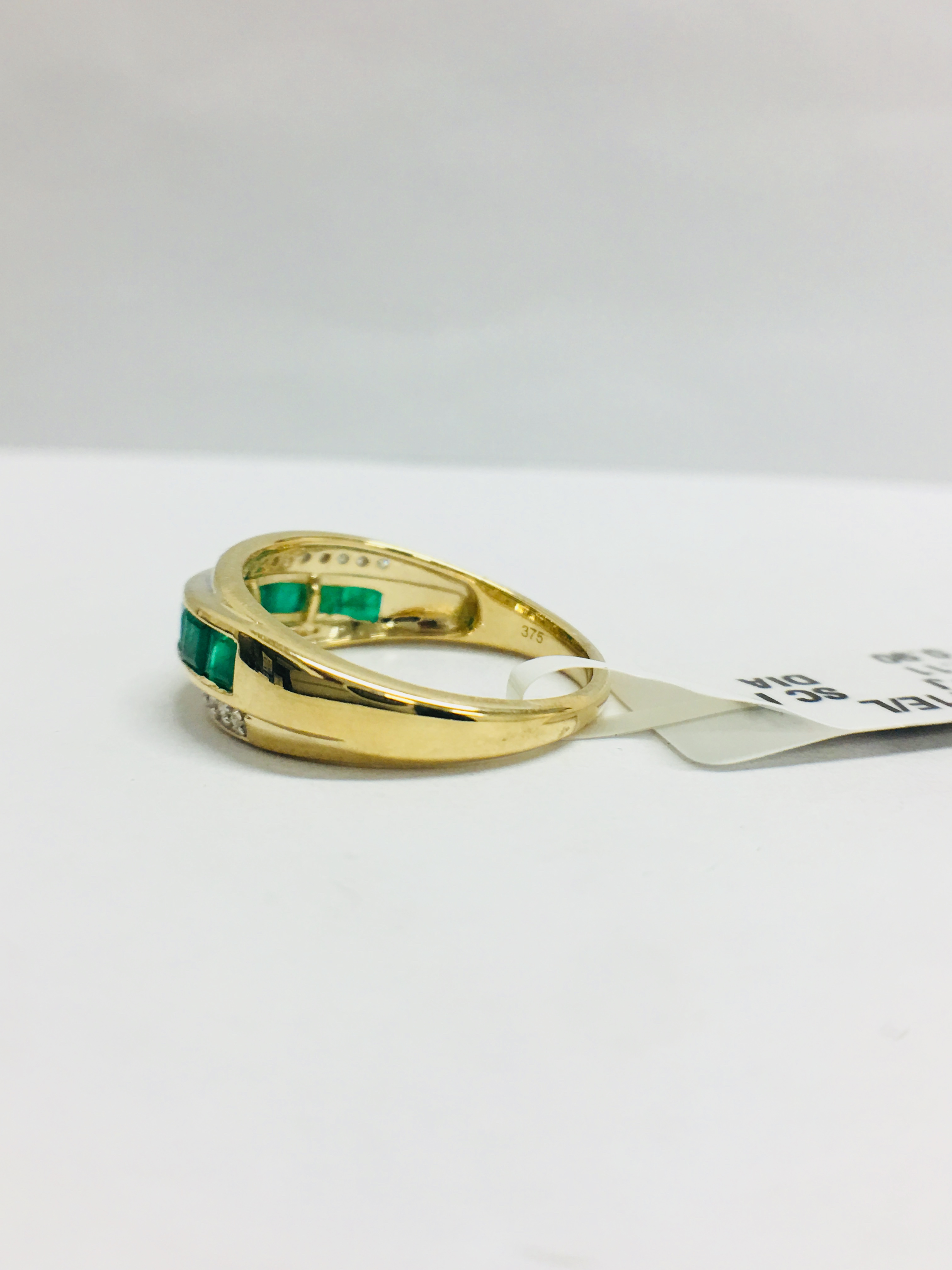 9Ct Yellow Gold Diamond Emerald Crossover Style Ring, - Image 4 of 10