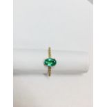 0.80Ct / 0.12Ct Emerald And Diamond Dress Ring.