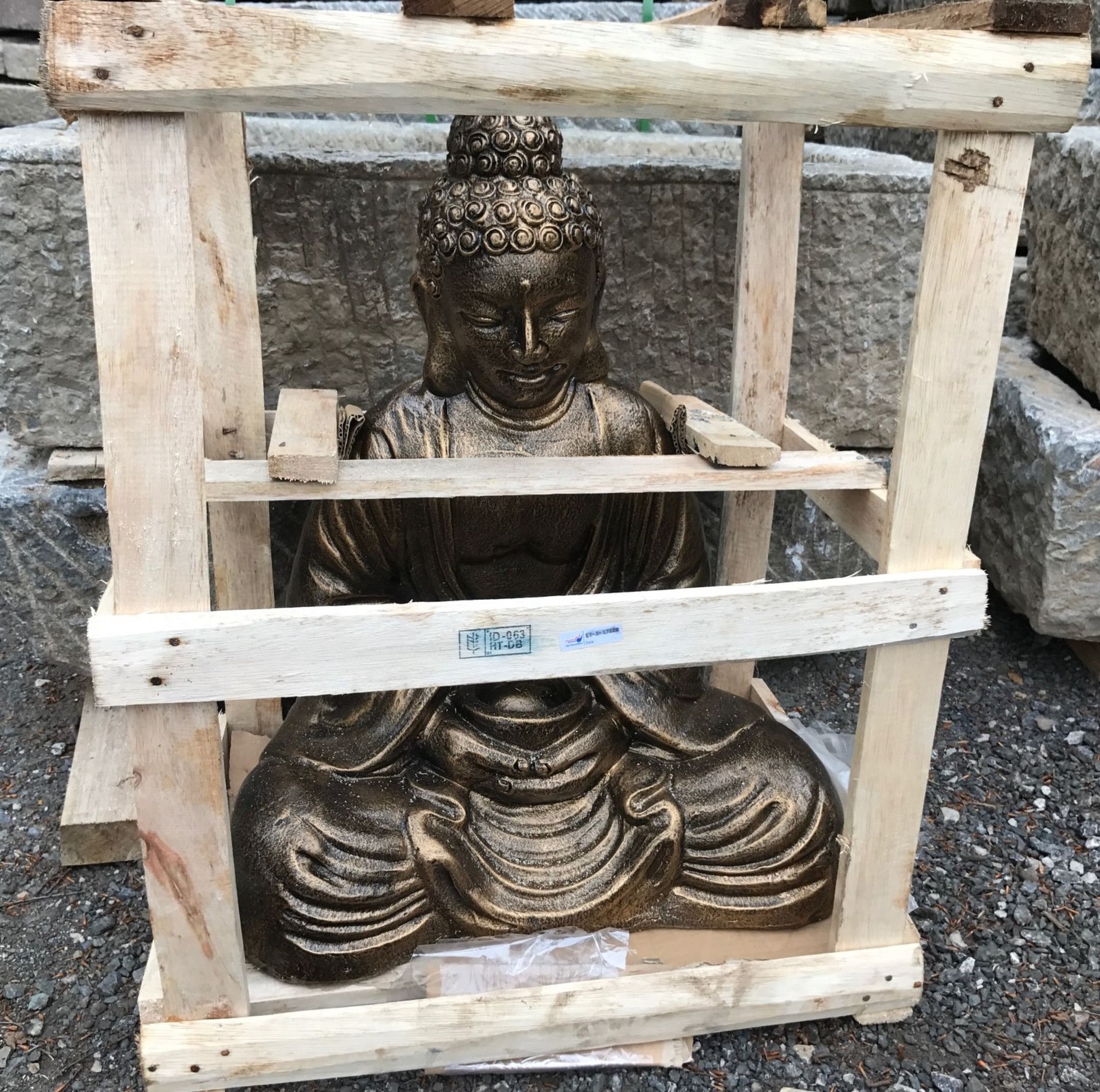 CRATED HANDFIRED TERRECOTTA BUDDHA SITTING IN BRONZE