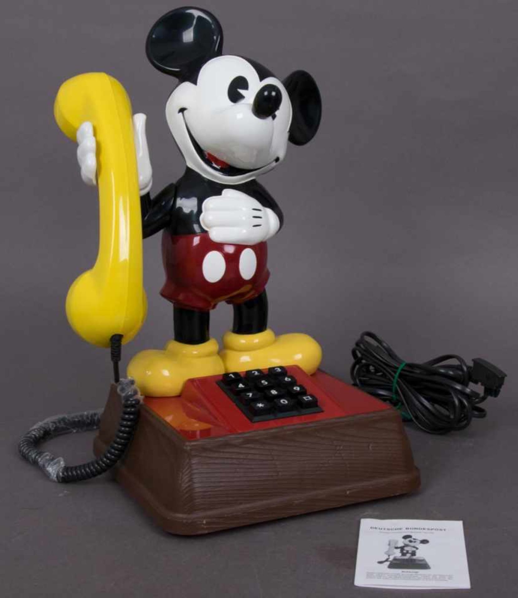 MICKY MAUS-TELEFON, Typ "TEL 322". Höhe ca. 38,5 cm. Analoges Telefon mit Drucktasten, wurde nur als