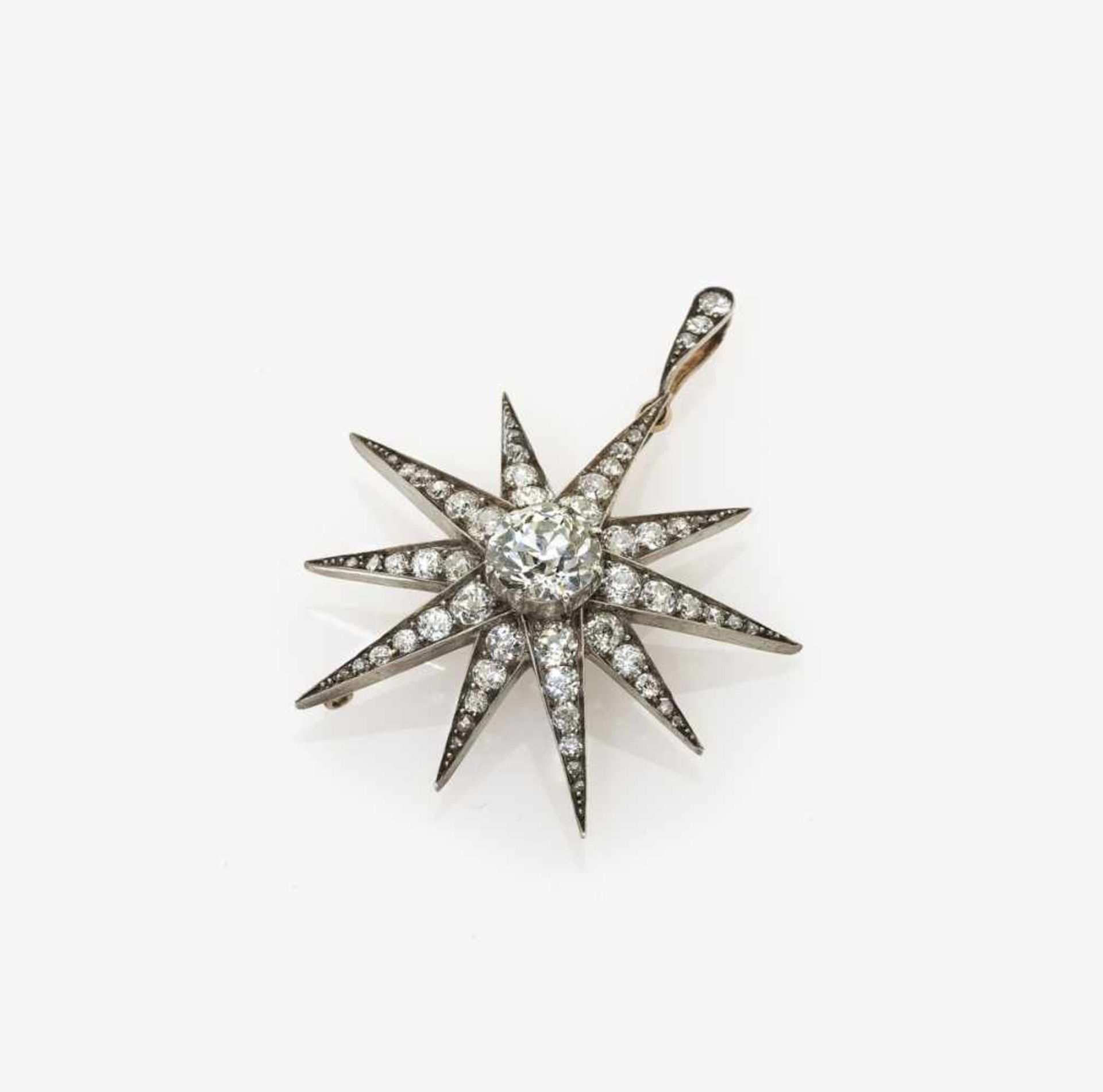 A Star-Shaped Diamond PendantVienna, circa 1870 14K gold (585/-) and silver, tested. Viennese