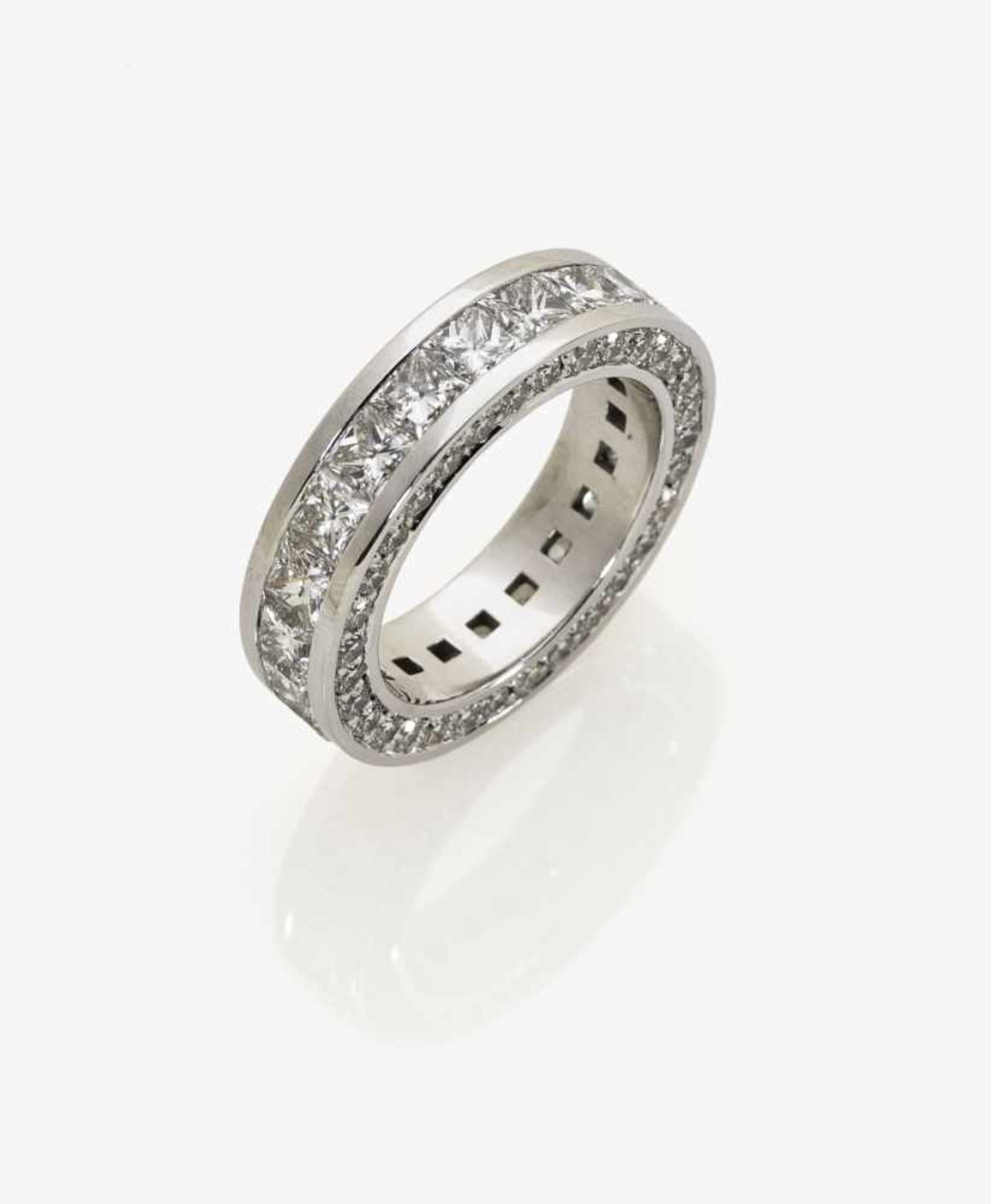 A Diamond Eternity RingGermany 18K white gold (750/-), stamped. 65 brilliant-cut diamonds,