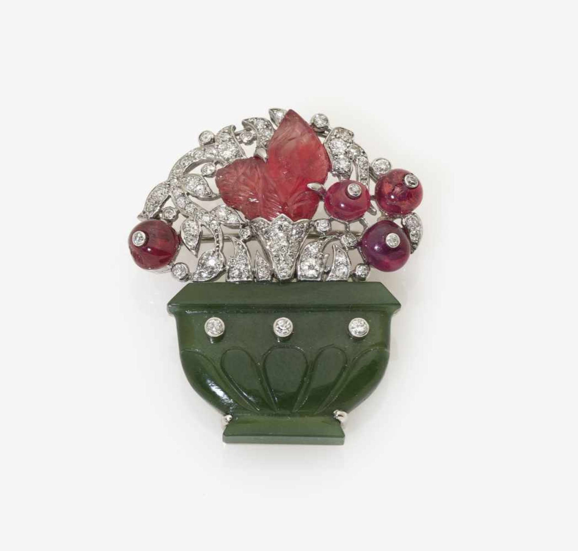 A Brooch in the Form of a Vase of FlowersParis, circa 1930, CARTIER 18K white gold (750/-),