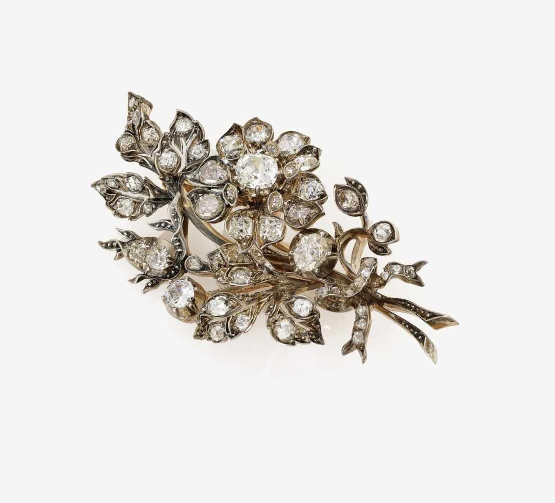 A Diamond Floral Spray BroochGermany, circa 1890 14K rose gold (585/-) and silver, tested. Circa