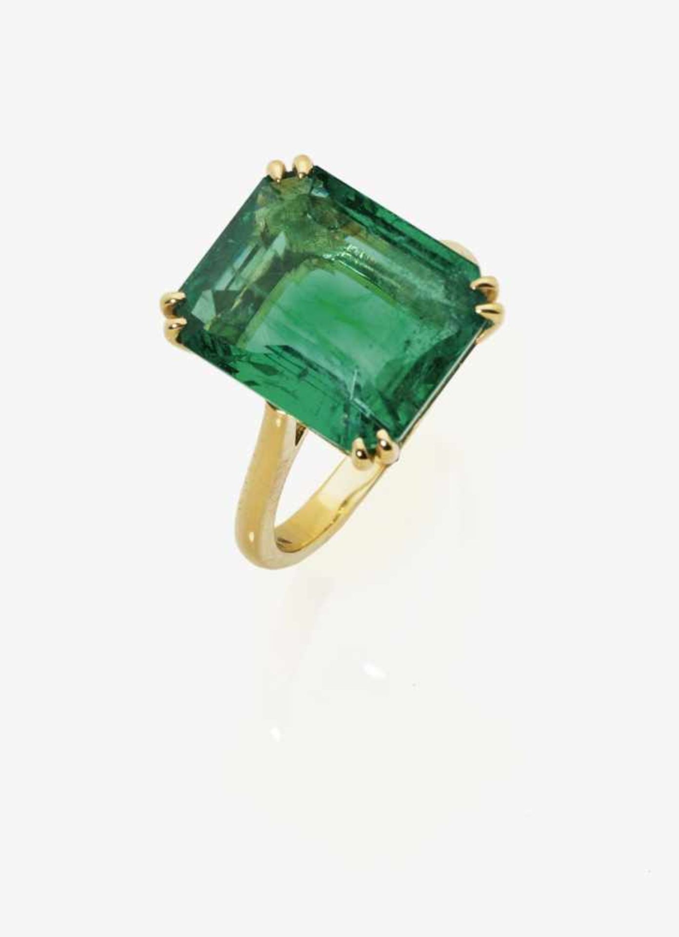 An Intense Green Emerald Solitaire RingFrance, Paris, 2000s, GALERIE DU DIAMANT 18K yellow gold (
