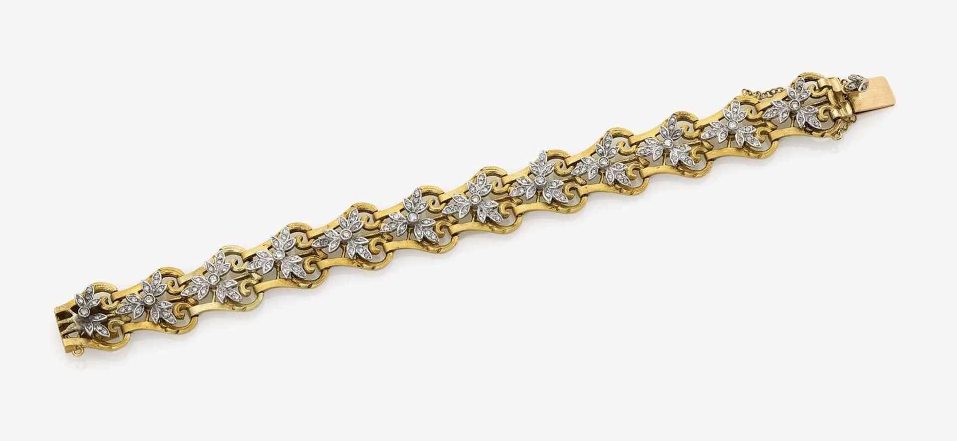 A Diamond set BraceletFrance, circa 1915 18K yellow and white gold (750/-), stamped. Hallmarks. 12