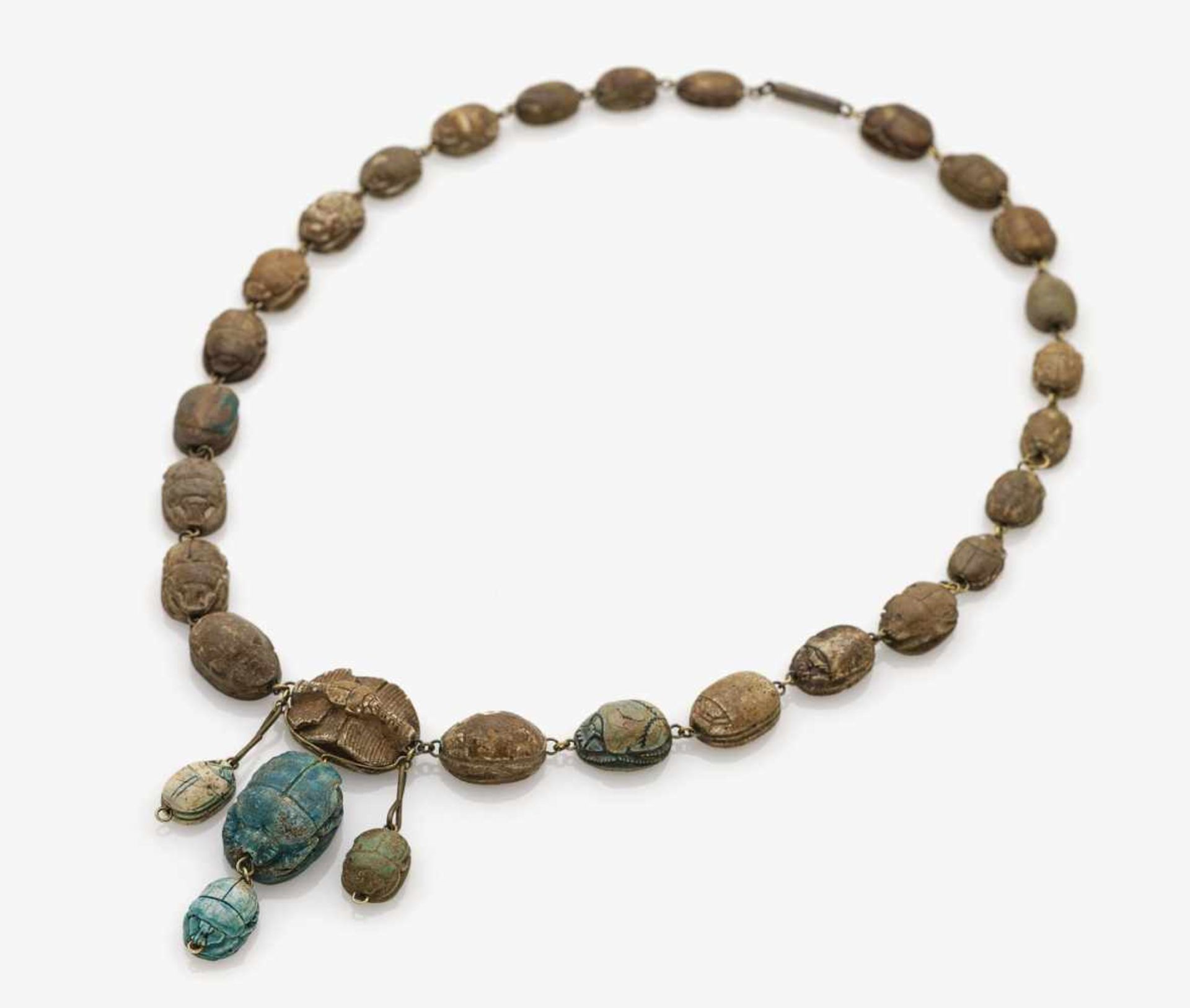 A Scarab NecklaceProbably Egypt, antique and 19th century Metal, partially gold plated. Necklace