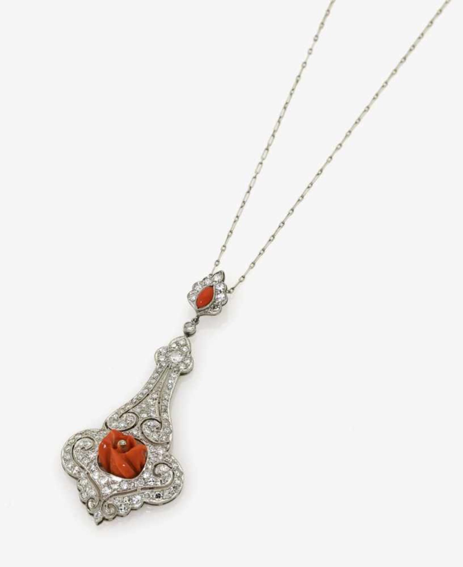 A Diamond and Coral Pendant NecklaceUSA, circa 1925 Pendant: Platinum 950/-, stamped, necklace: