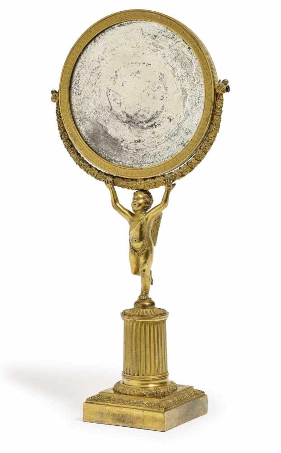 A hand mirrorParis, 19th century Rotating. Bronze, painted in gold. Old mirror glass. Height 33 cm.