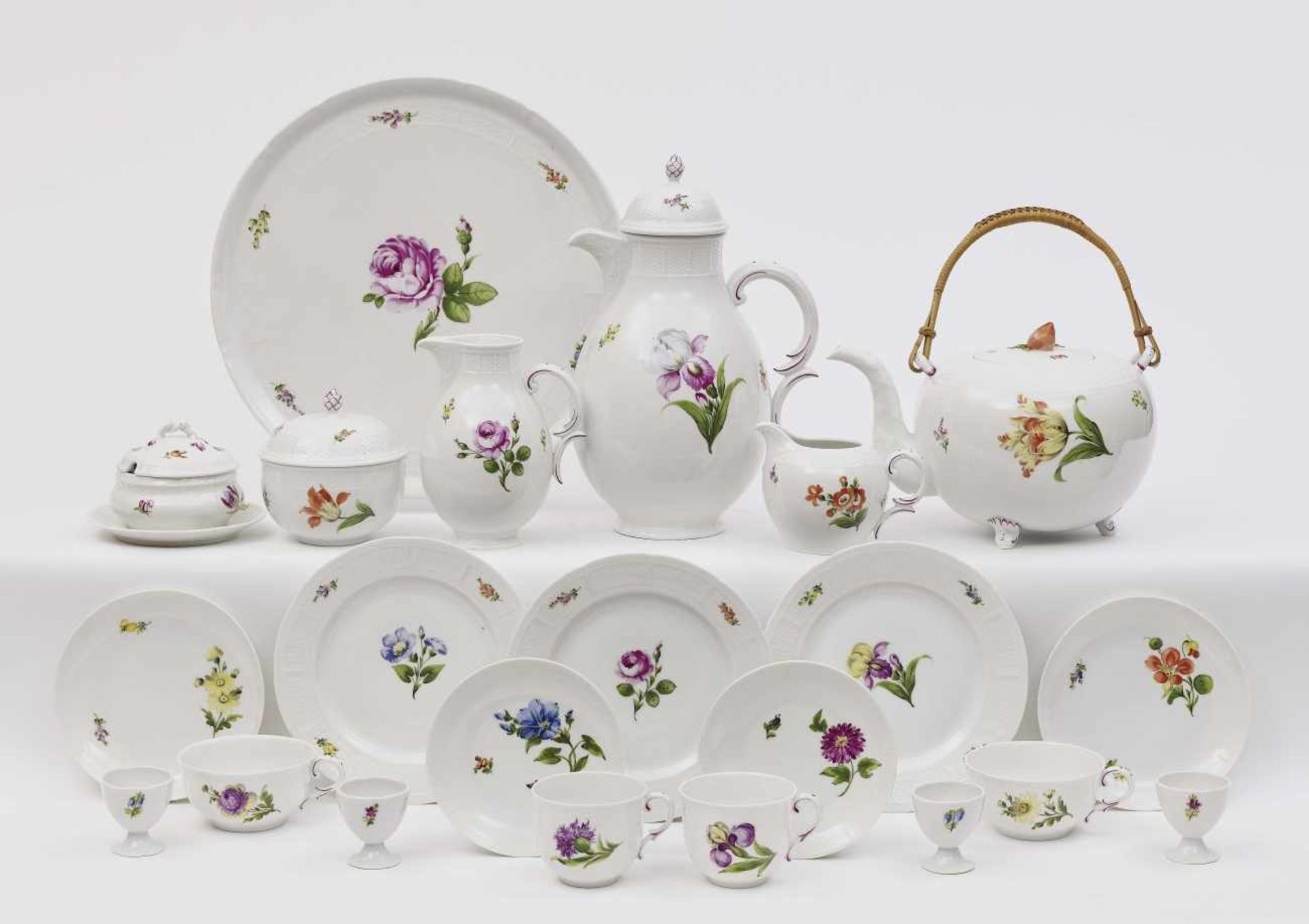 A 63-piece coffee and tea serviceNymphenburg Porcelain. Impressed marks and maker's marks. A few