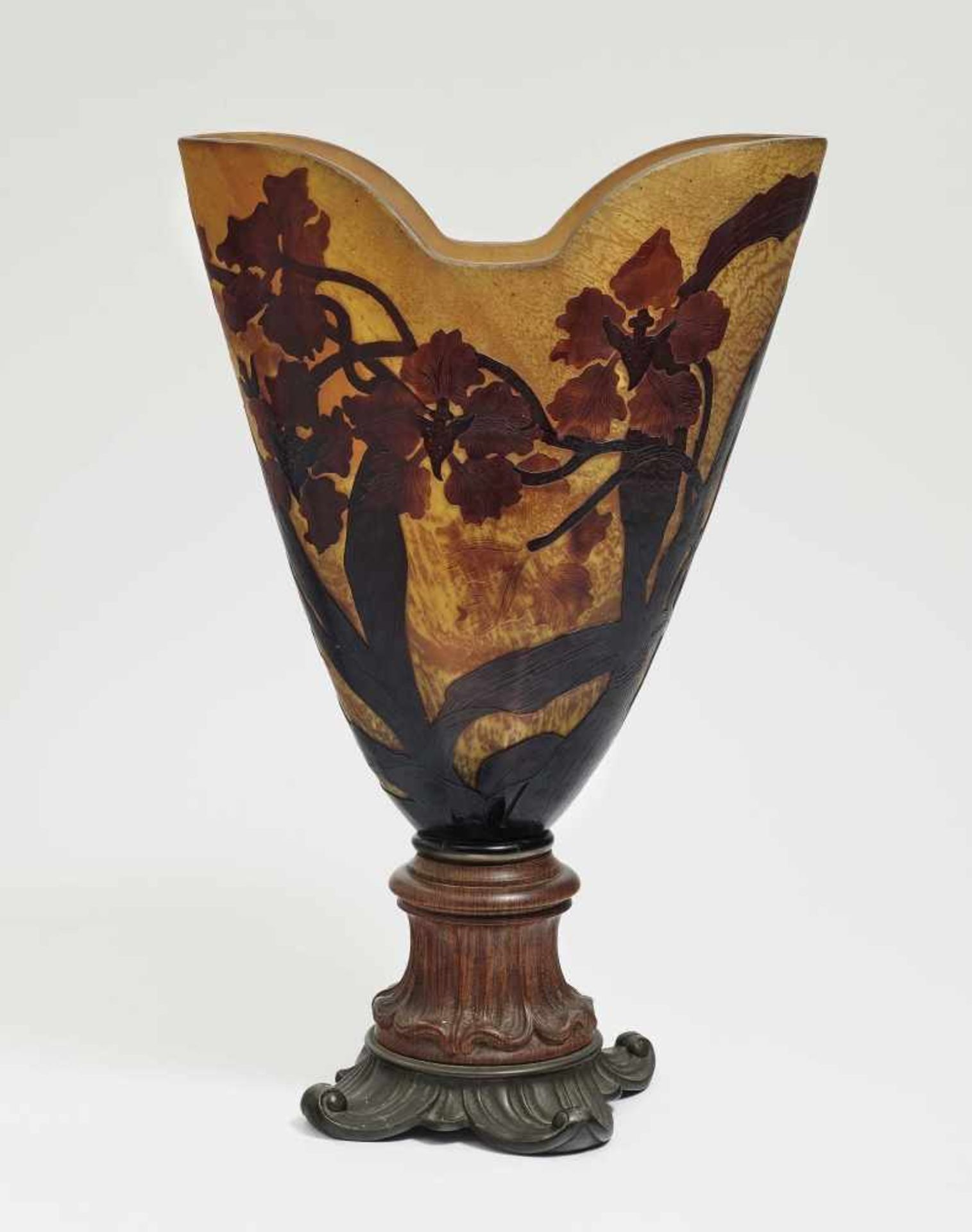 Vase with bronze footEmile Gallé, Nancy, circa 1900 Matted flashed glass. On a carved wooden base.