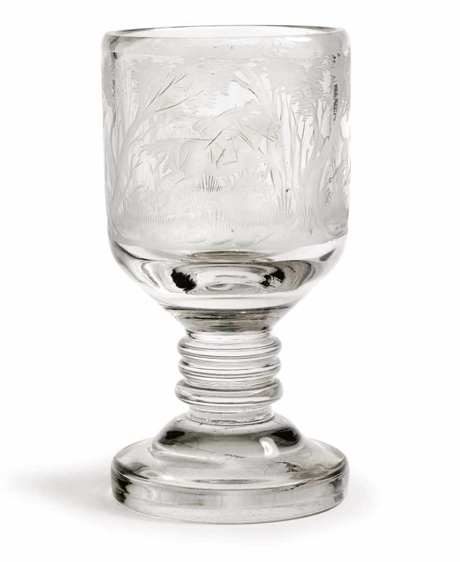 A gobletGerman, 2nd half of the 19th century Engraved hunting motifs. Glass. Height 20 cm.