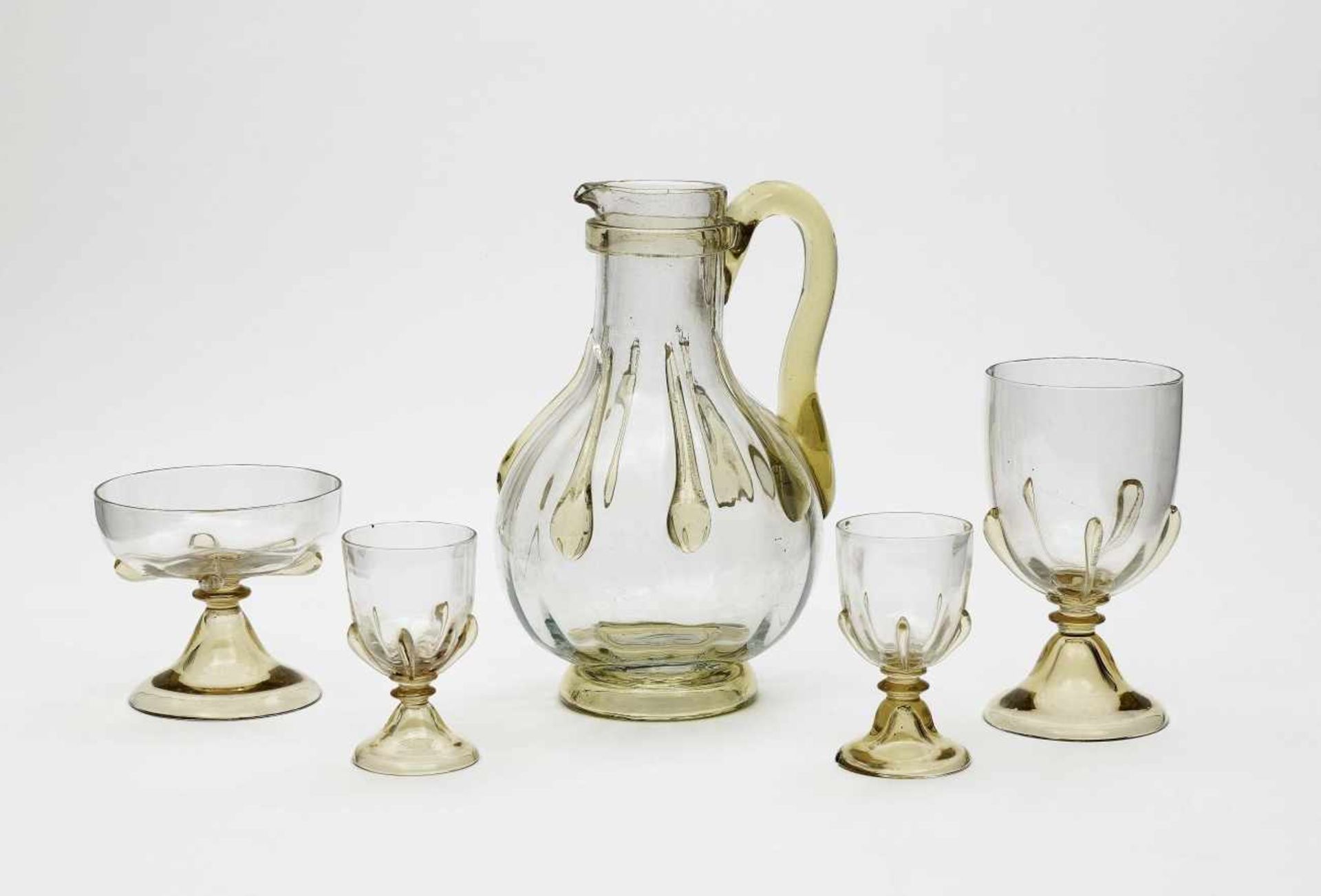 A five-piece drinking setEmile Gallé, Nancy, 1900-1910 Colourless glass. One glass inscribed