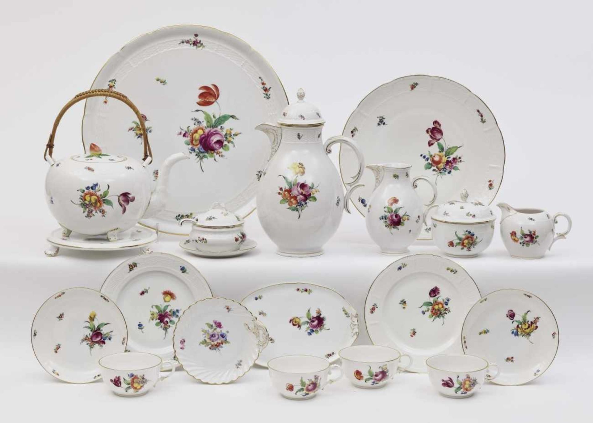 A 47-piece coffee and tea serviceNymphenburg Porcelain. Gold decoration. Impressed marks and maker's