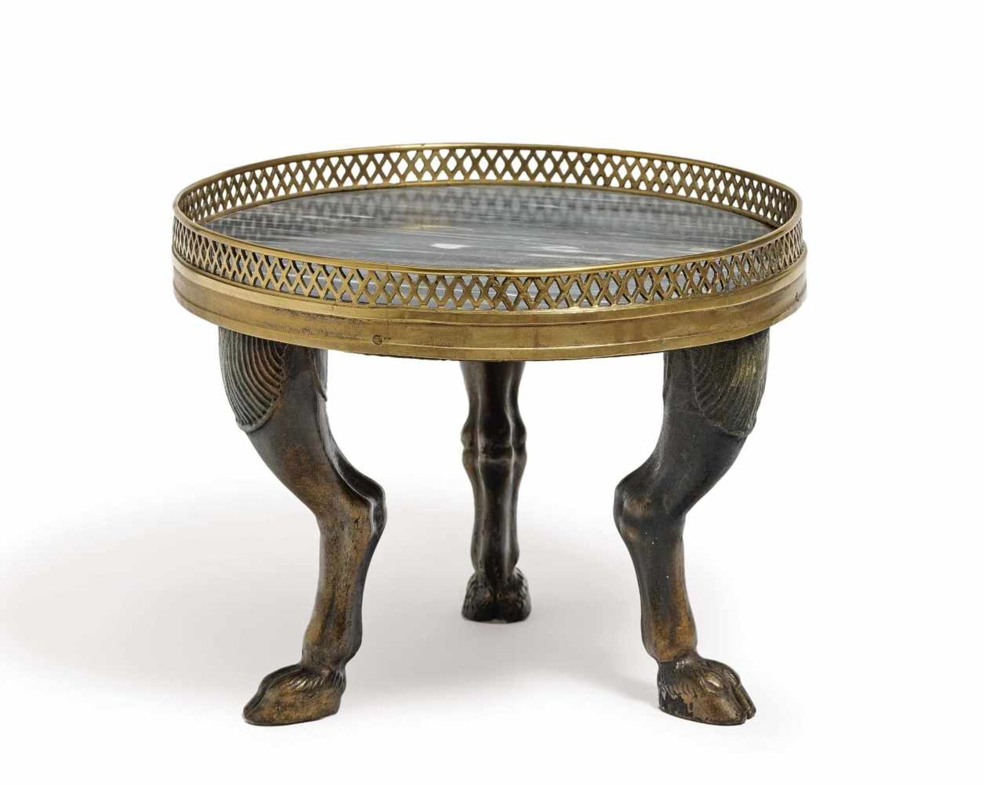 A centrepieceFrance, 19th century Wood, painted in bronze. Plate marble. Brass gallery. Height 19