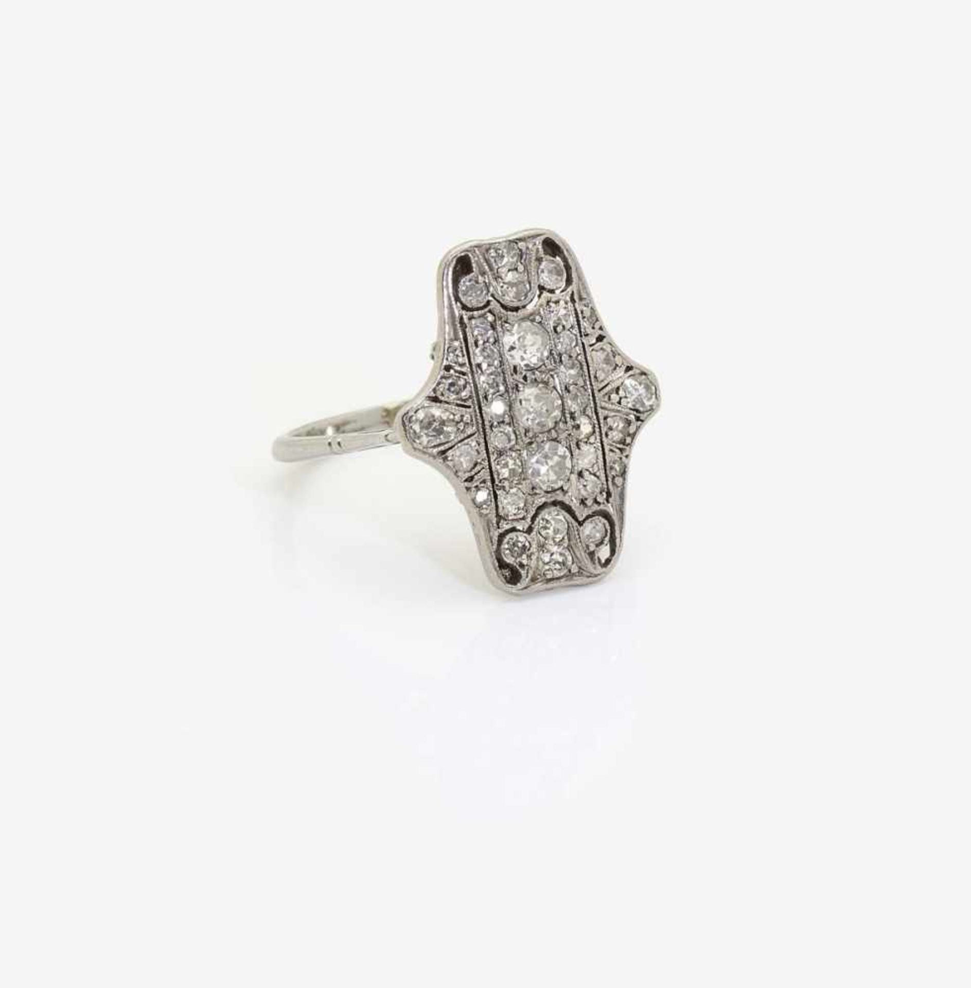 A Diamond RingUSA, circa 1920-1925 Platinum, tested. 35 varyingly old-cut diamonds, altogether circa