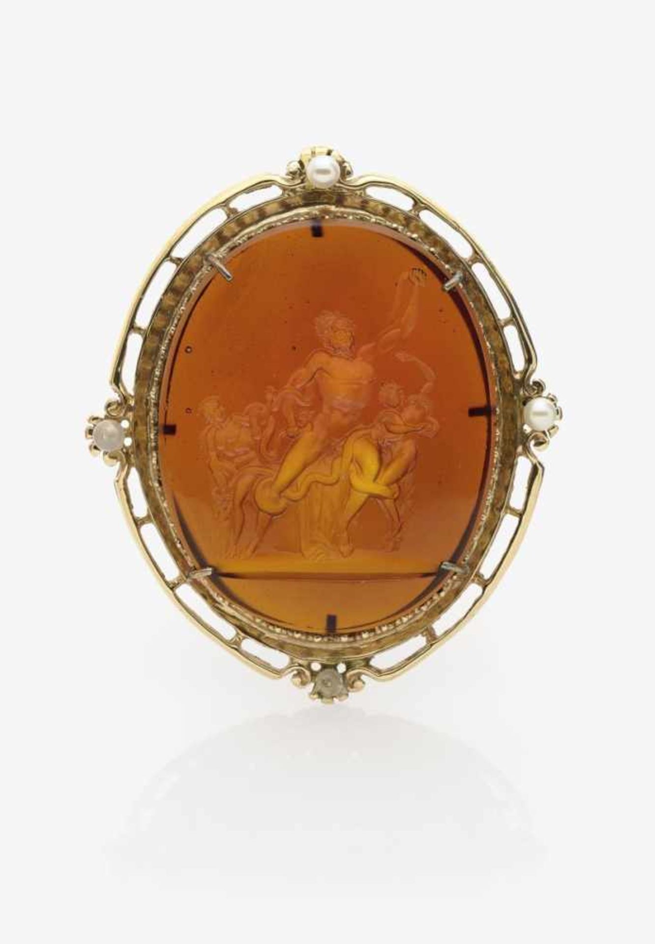 A Carved Glass PendantGermany, circa 1880 14K yellow gold (585/-), tested. Hallmarks. Carnelian