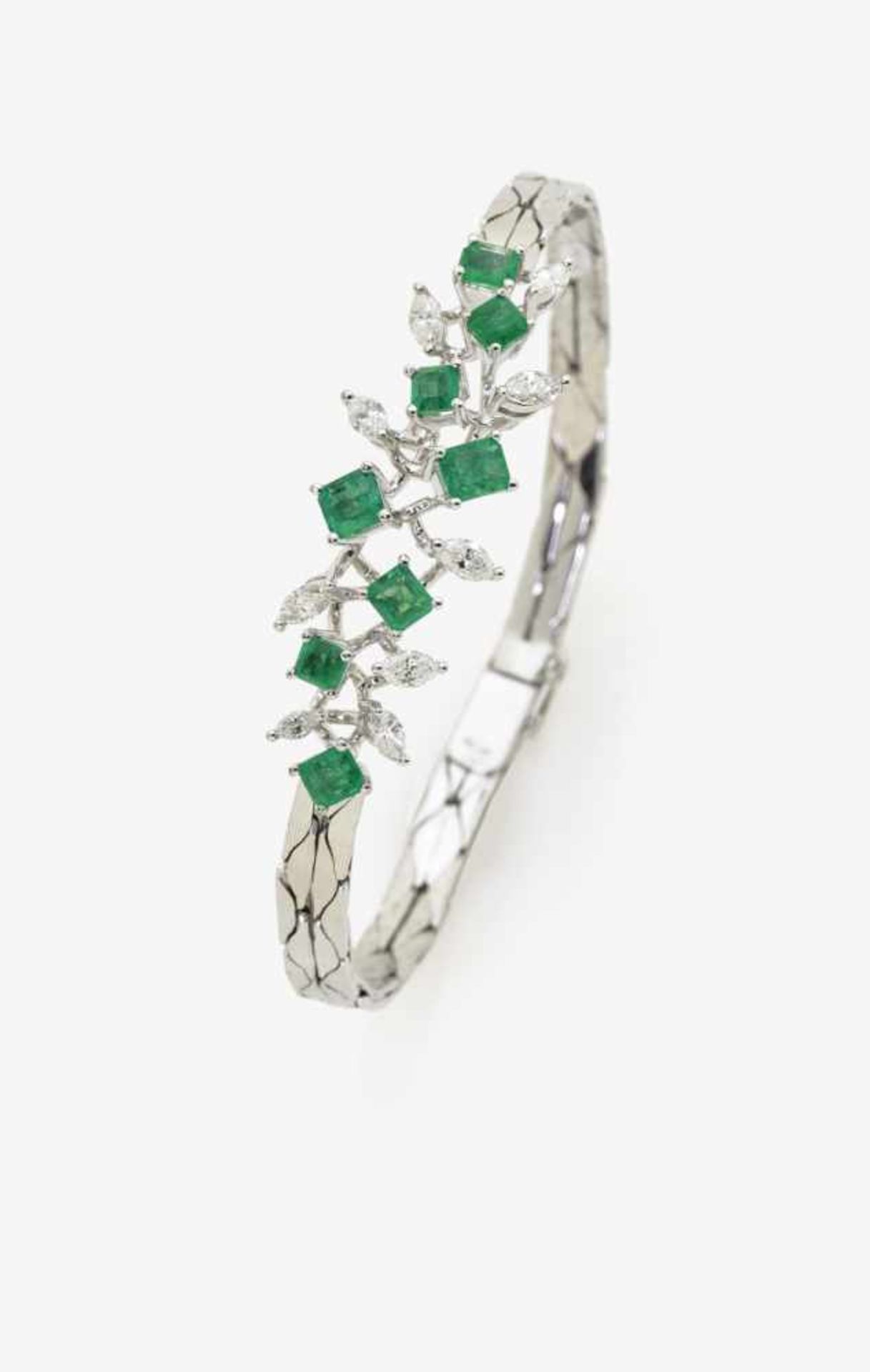 An Emerald and Diamond BraceletUSA, 1970s 18K white gold (750/-), stamped. Maker's mark JK. 9