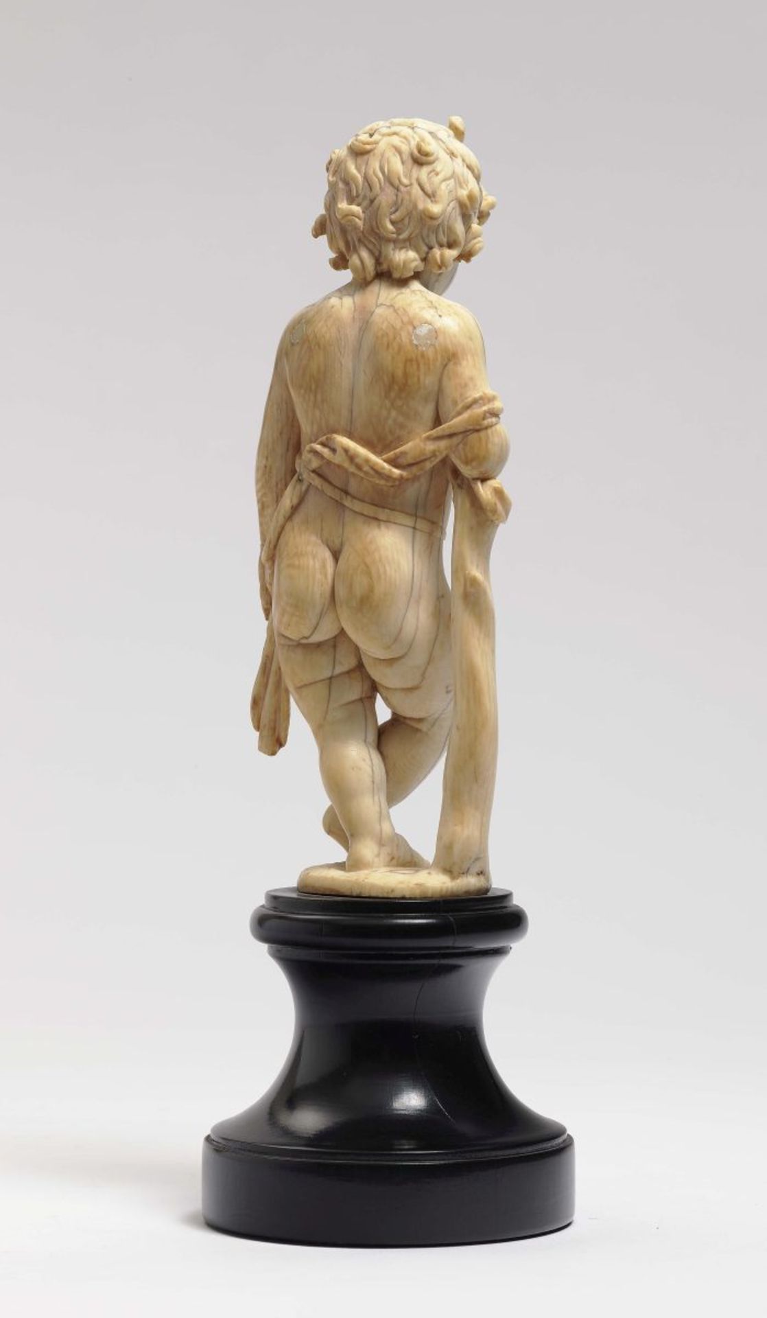 CupidFlemish, 16th Century Ivory, carved in full round. Wings missing. Height 17 cm.Angel, - Bild 2 aus 3