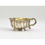 A Vodka CupMoscow, circa 1785, master S. F. Silver, partly gilt. Engraved, chased and stylized