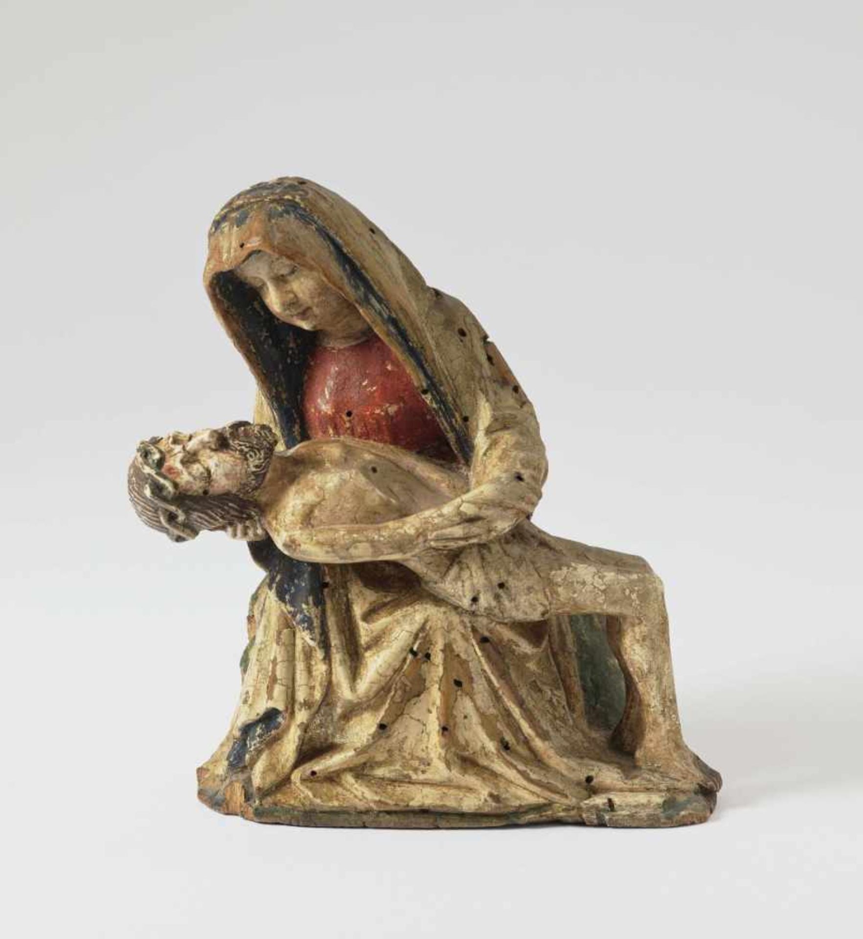 A PietàRhenish (?), circa 1430 Limewood, back partially hollowed out. Remnants of polychrome