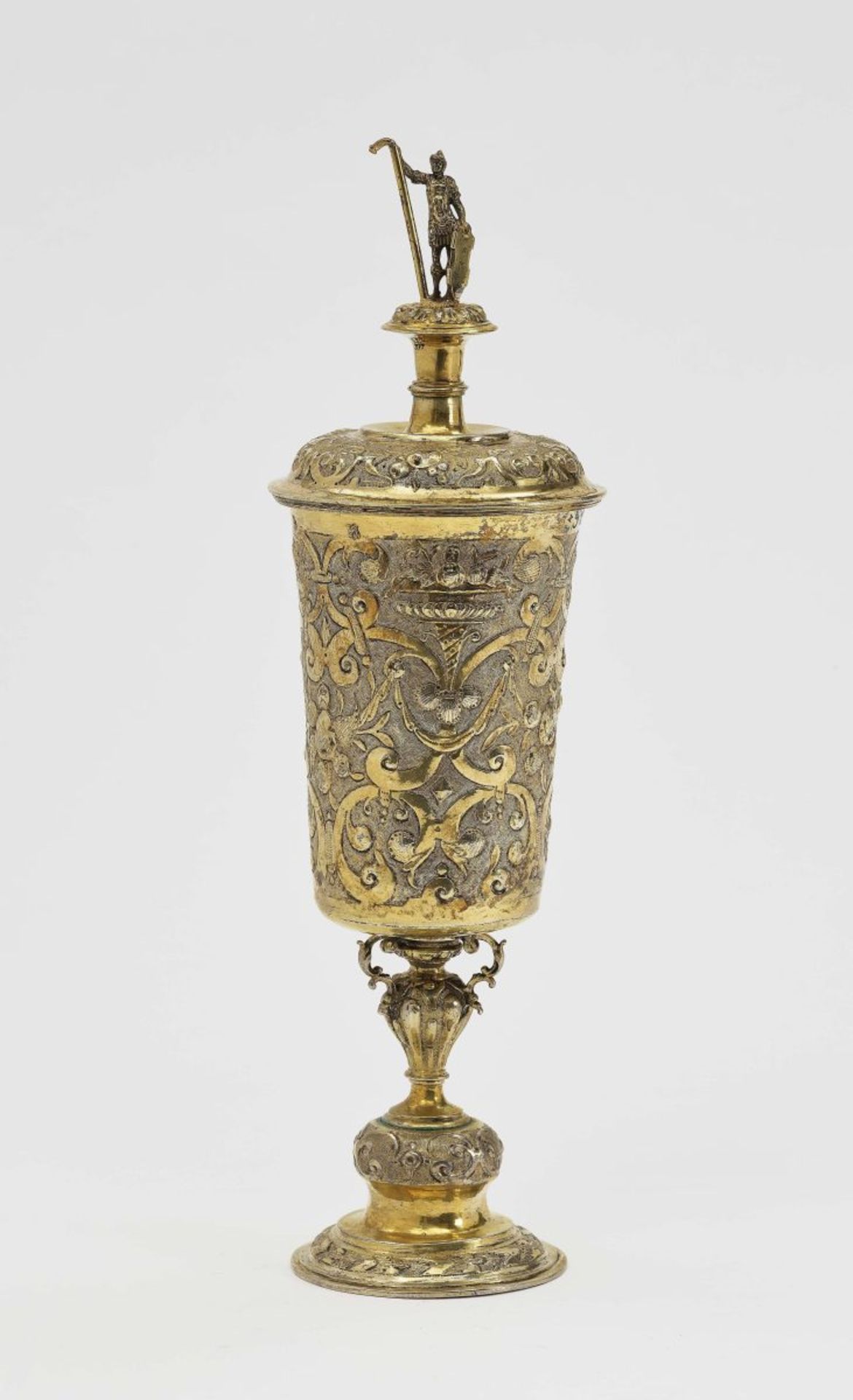 A Silver Cup and CoverUlm, 1609 - 1619, probably Hans Baur Silver, gold-plated. Tapering cylindrical