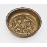 A BowlGerman, circa 1500 Brass. Embossed decoration. Repaired, minor damage. Diameter 28 cm.Tiefe