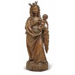 The Virgin and ChildRhenish, circa 1420 Standing contrapposto on a polygonal pedestal, holding the