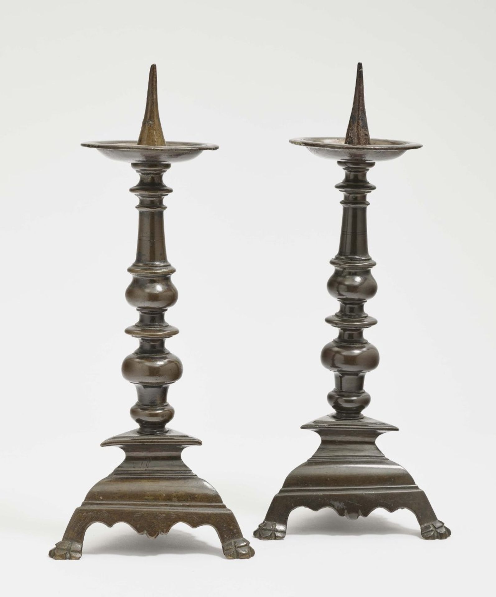 A Pair of CandlesticksItaly, 17th Century Bronze, dark brown patina. Height 35 cm.Furnishings, Home,