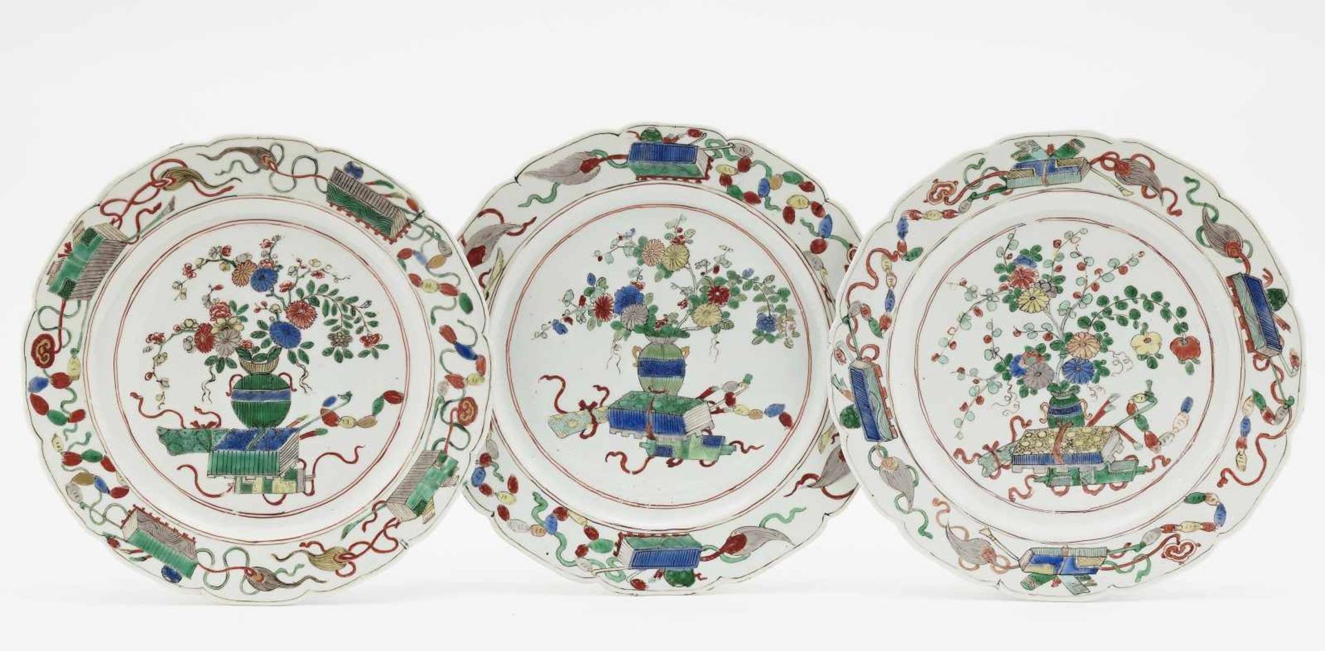 Three PlatesChinese, Qing Porcelain. Decorated in the style of the ''famille verte''. Blue marks.