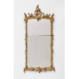 A MirrorSouth German, 18th Century Carved giltwood and metal (?). Restored, additions, slightly