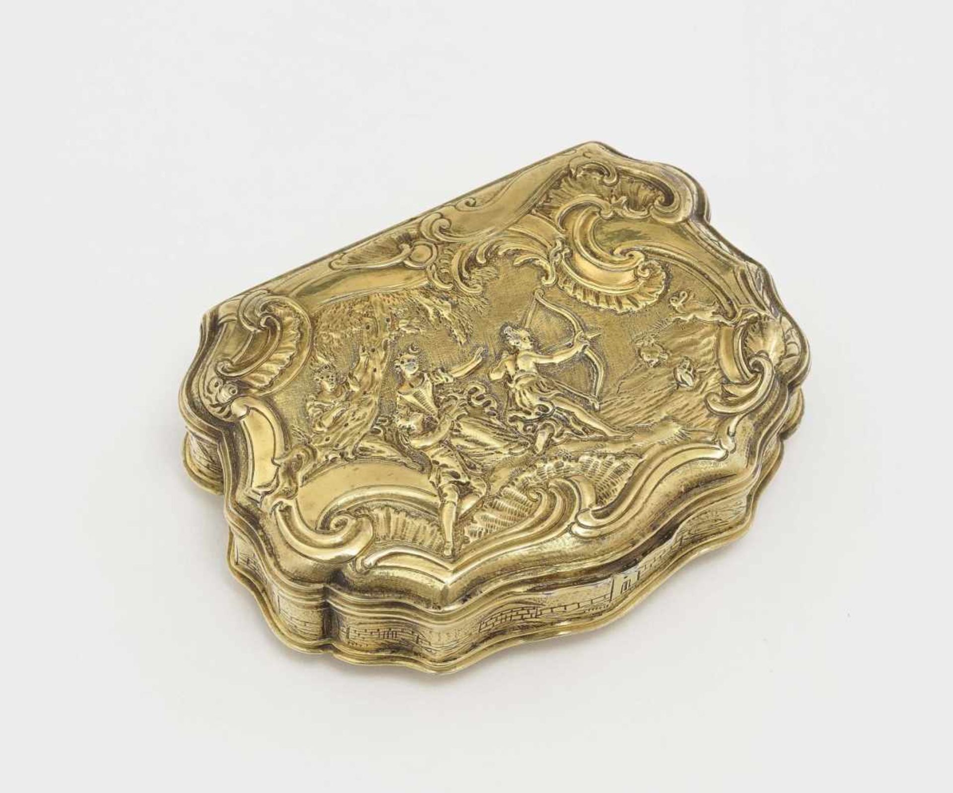 A Snuff BoxFrance (Ste. Menehould?), circa 1760 Silver, gold-plated. Hammered, chased and embossed