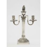 A Three-Light CandelabrumZittau, circa 1800, Jung Silver. Engraved coat of arms on the plinth.