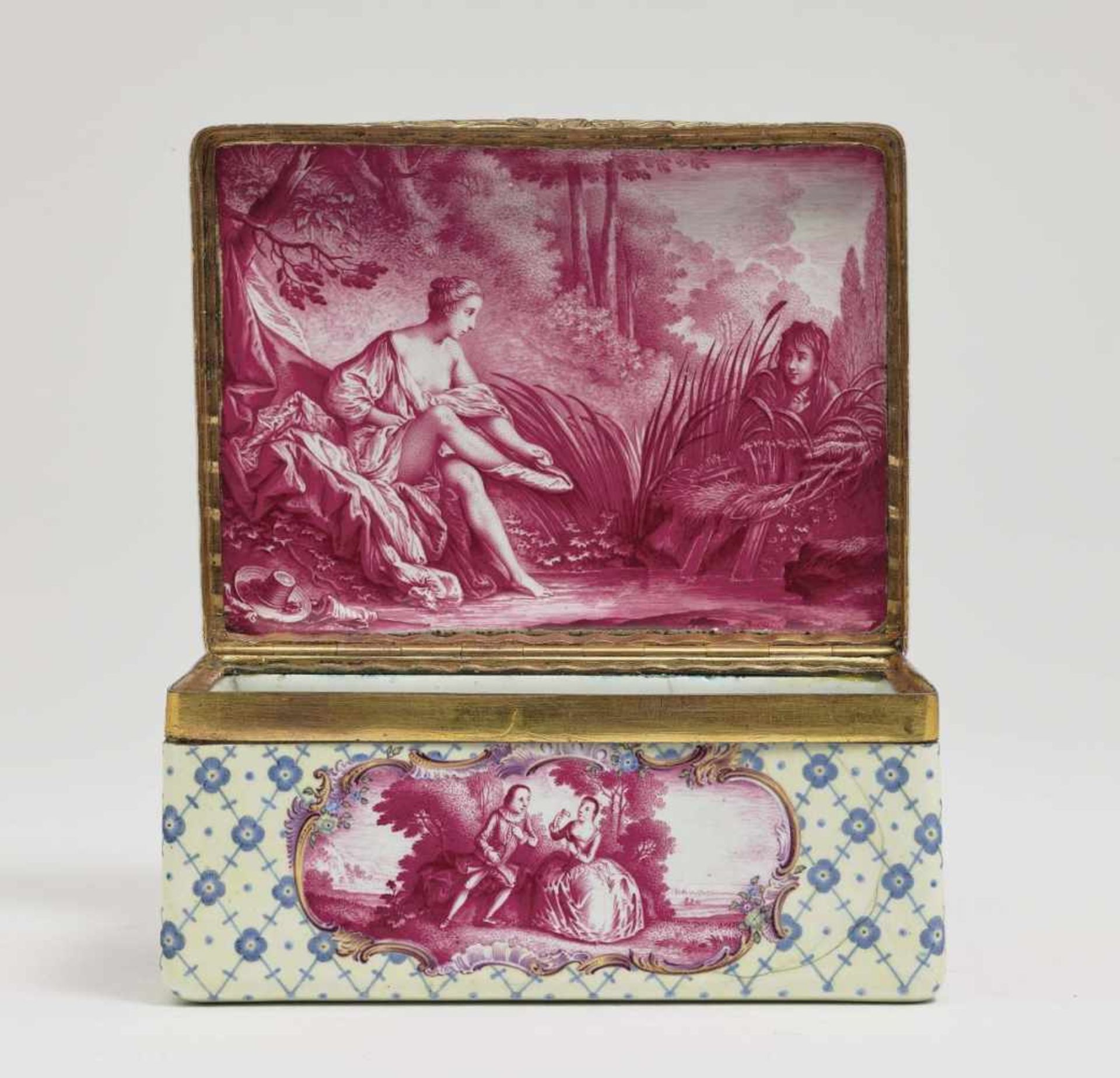 A Snuff BoxMid-18th Century Enamel on copper. Gold-plated copper mount. Rectangular with hinged lid.