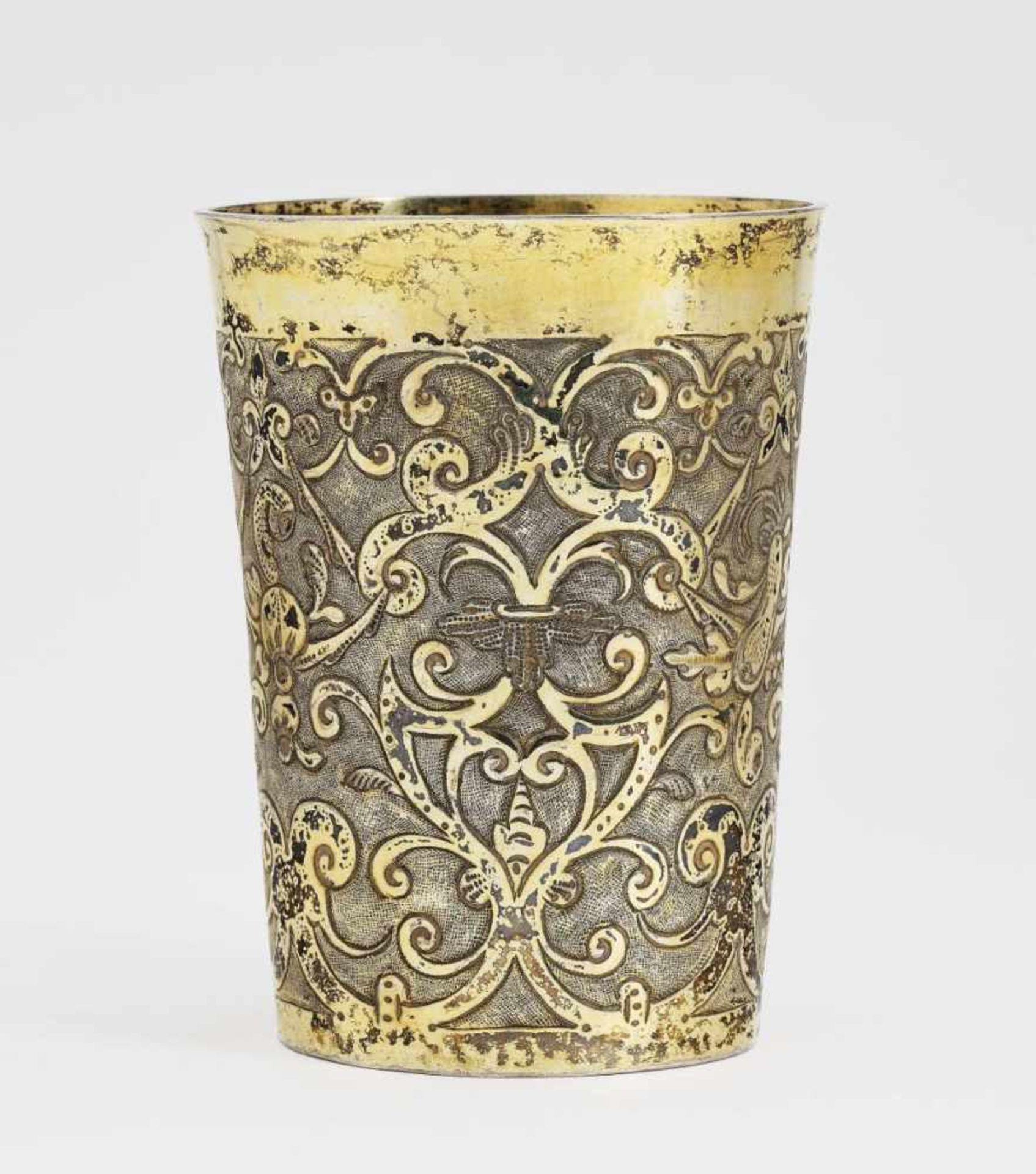 A Silver BeakerAugsburg, 1606 - 1610, Hans Bair Silver, gold-plated. Tapering cylindrical form.