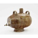 A BarrelWaldenburg, 17th Century Salt-glazed, speckled stoneware. Brass tap. Damaged. Height 38