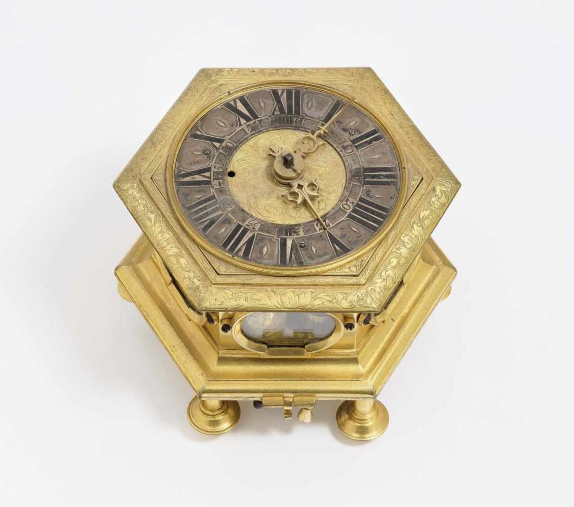 A Horizontal Table ClockAugsburg, circa 1700, Jacob Mayr Fire-gilded bronze. Six-sided case with