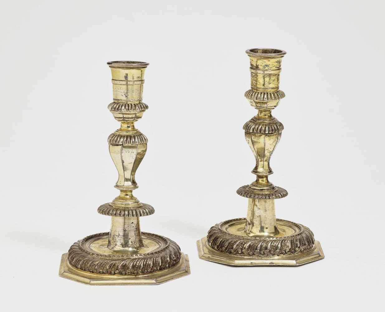 A Pair of CandlesticksAugsburg, 1701 - 1705, Georg III Lotter Silver, gold-plated. Faceted