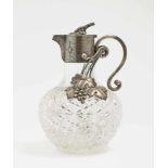 A Juice JugMoscow, circa 1880, Fedor A. Lorie Colourless, cut glass. Silver mount inside gold-