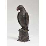 A ParrotSouth German, circa 1600 Perched on a branch, head slightly tilted to the right. Bronze,